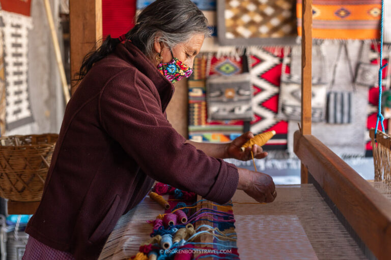 An artisan weaving a traditional Zapotec rug