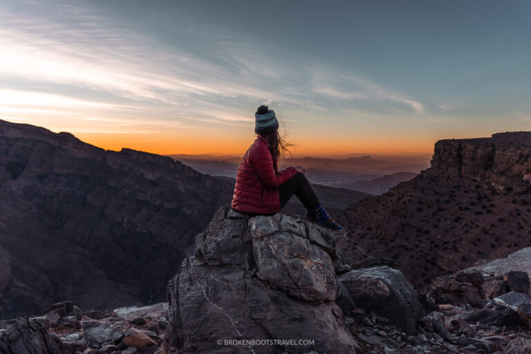 Woman looking out at Wadi Ghul from Jebel Shams