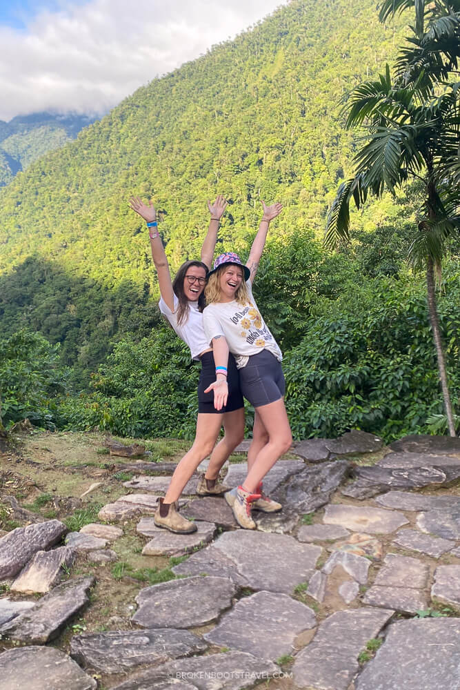 Two girls in front of green mountains Lost City Colombia