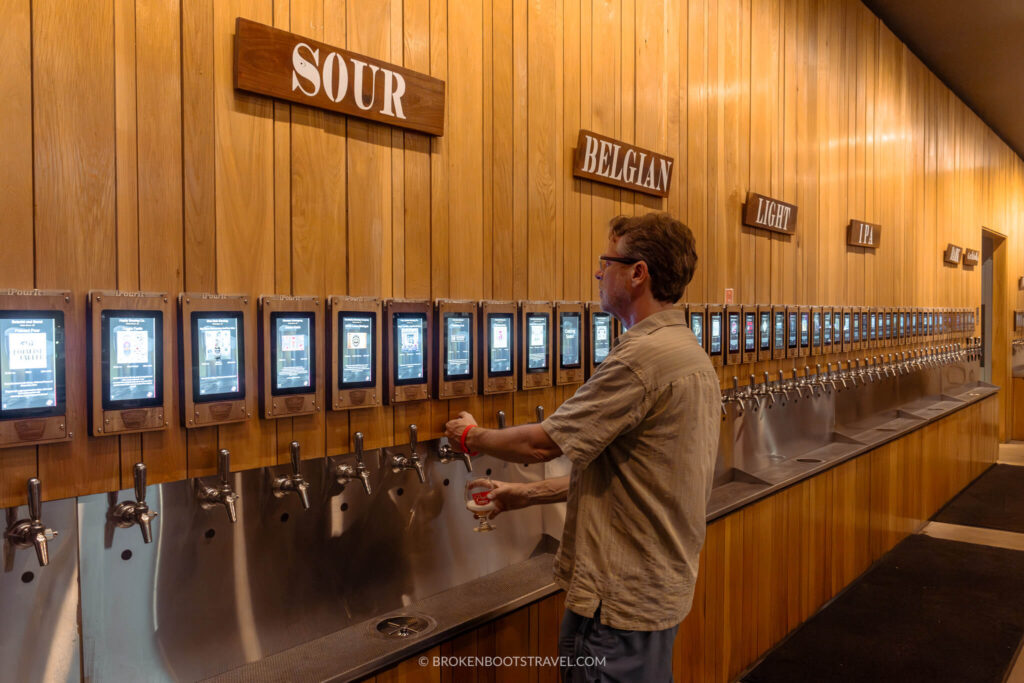 Man pouring a beer on tap at Pour Taproom in Durham, North Carolina