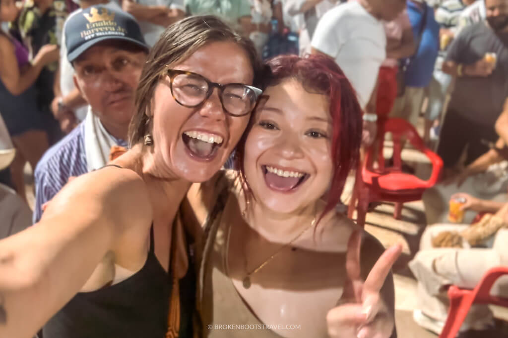 Two girls smiling and posing