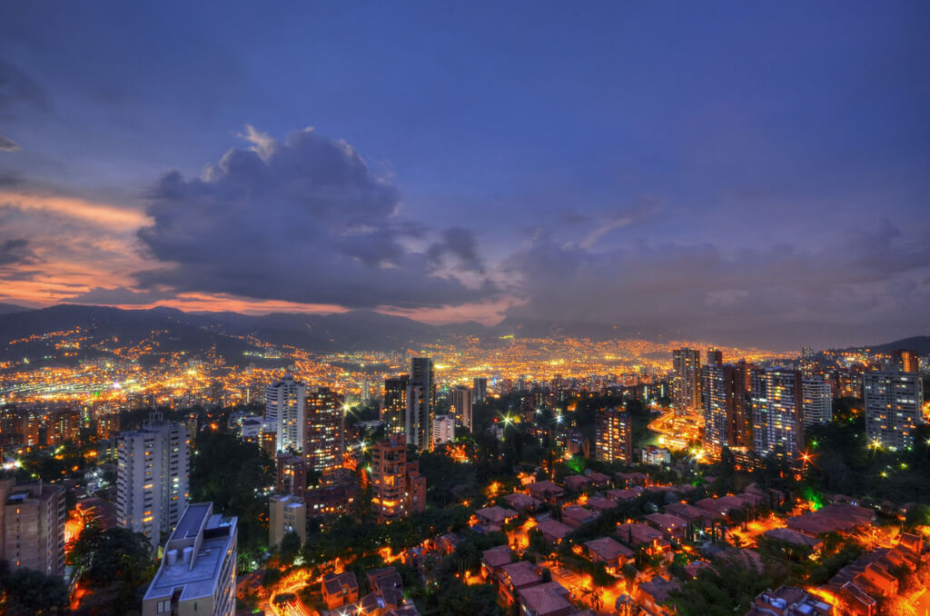 Skyline of Medellin, Colombia, with sunset in the background bogota medellin itinerary