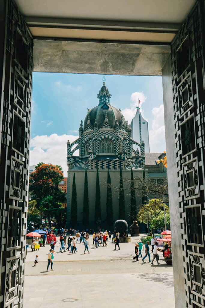 Black and white church in Plaza Botero, Medellín, Colombia