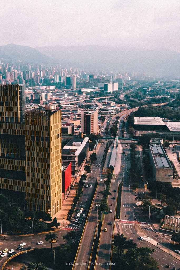 Bird's eye view of Medellin, Colombia with city highway - Is Colombia Safe to Visit?