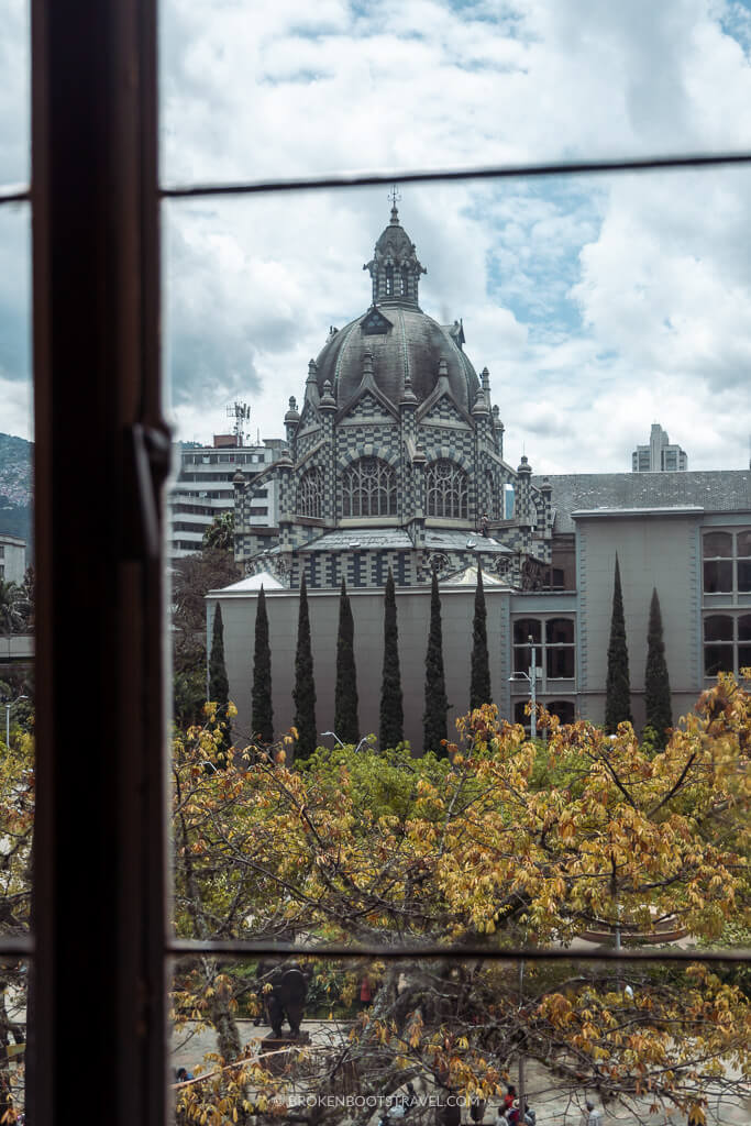 Palacio de la Cultura in Medellin, Colombia with trees in the foreground