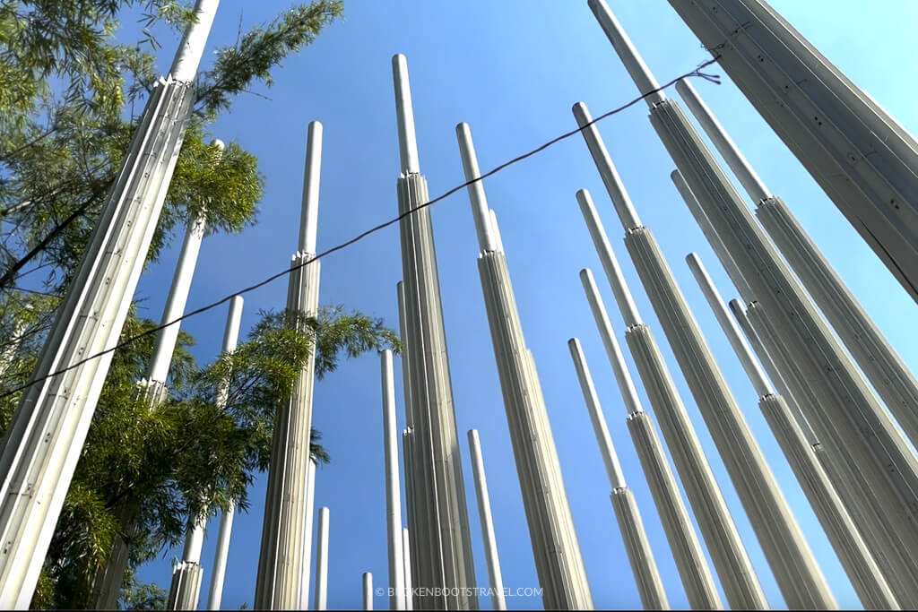 Sculptures in Parque Cisneros, Medellin with blue sky