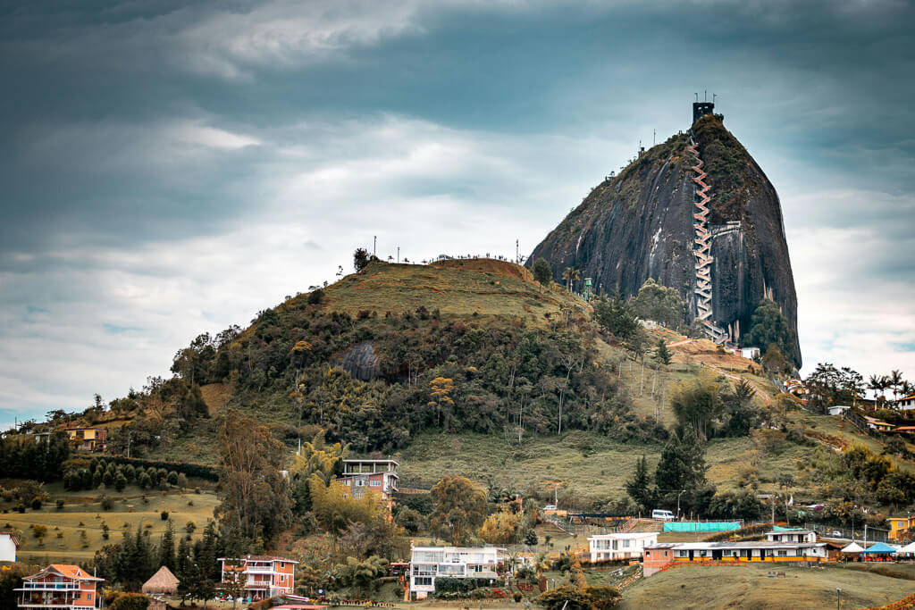 Penol de Guatape against blue sky with clouds