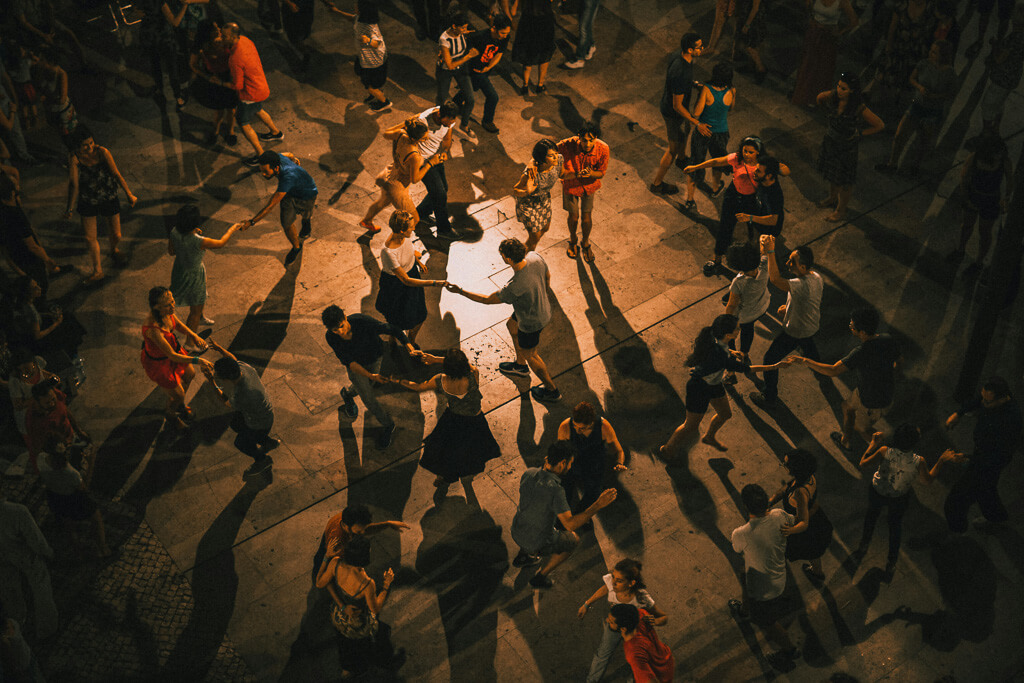 Dancers practicing salsas in a night setting