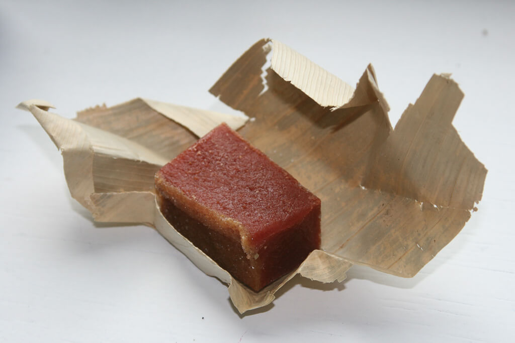 Bocadillo wrapped in a dried leaf