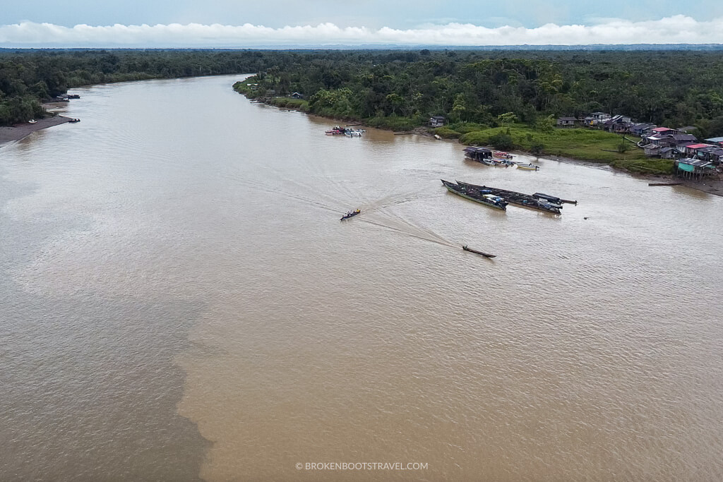 Aerial shot of the Río Atrato with boats passing by