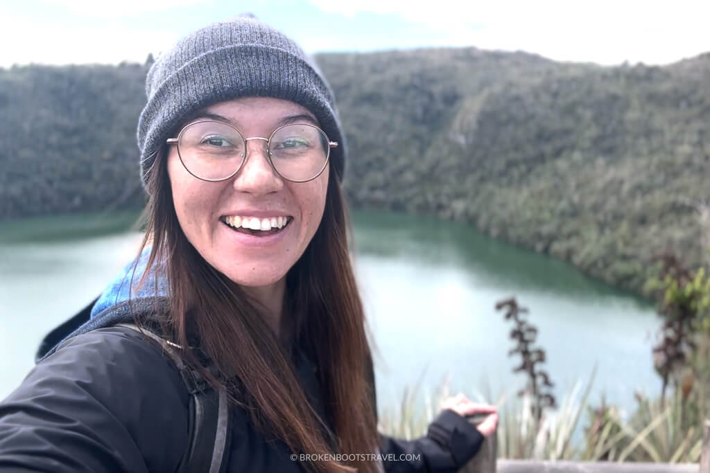 Girl smiling in front of Laguna Guatavita